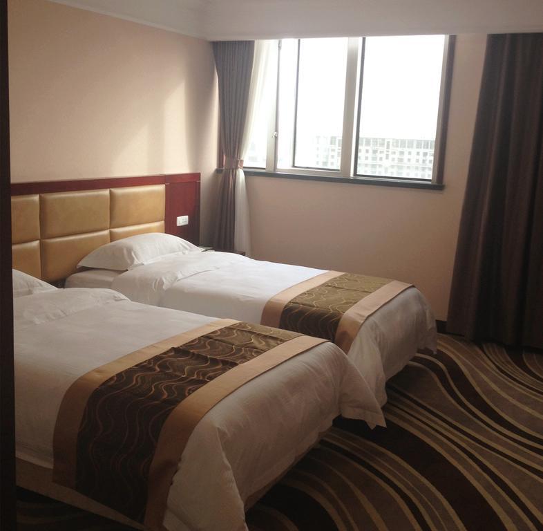 Qingdao Hotel Quarto foto