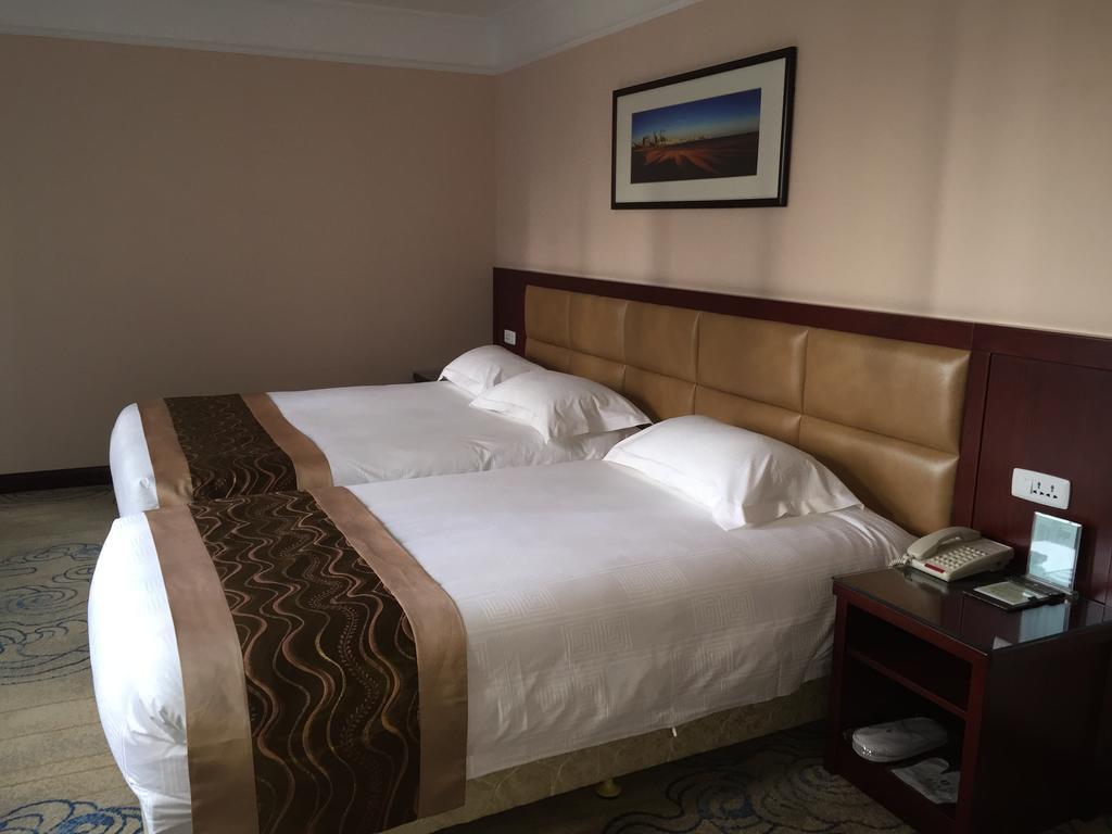 Qingdao Hotel Quarto foto